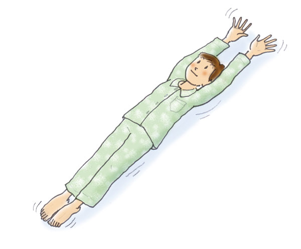 起床時の動き3：横になったまま、さらに体を伸ばす